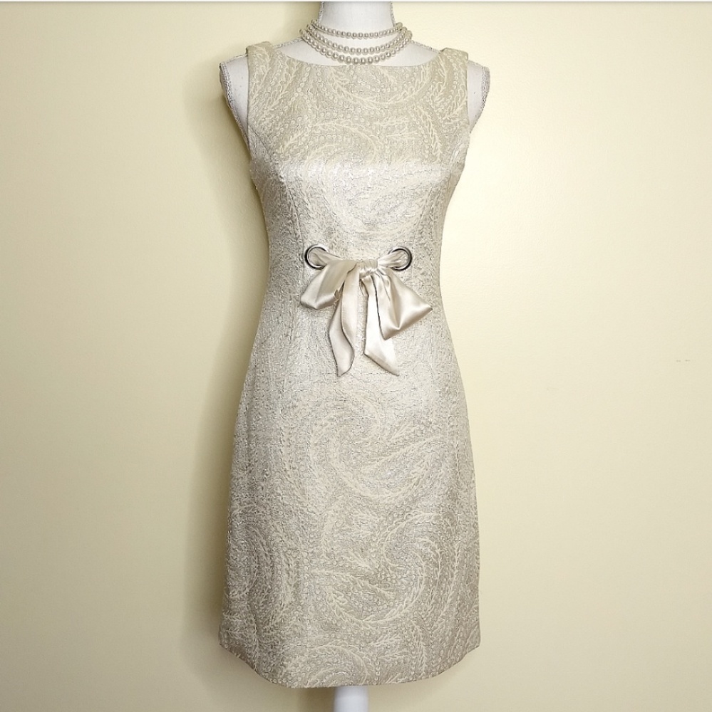 Shimmer cream sleeveless shift dress with bow